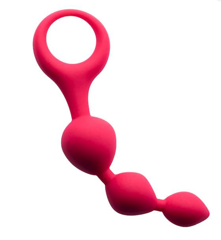 A silicone ring is attached to a long tail that has three bump along it's length and the whole item is a vibrant red colour.